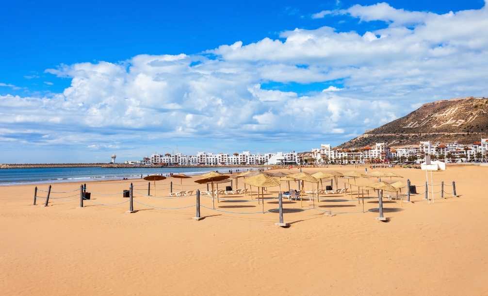 View of beach with blue sky a departure location for Agadir desert tours