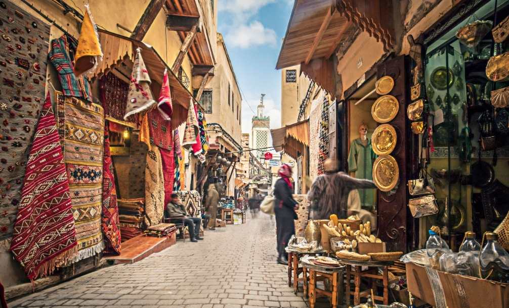 View of shops in the old medina a departure location for Fes desert tours